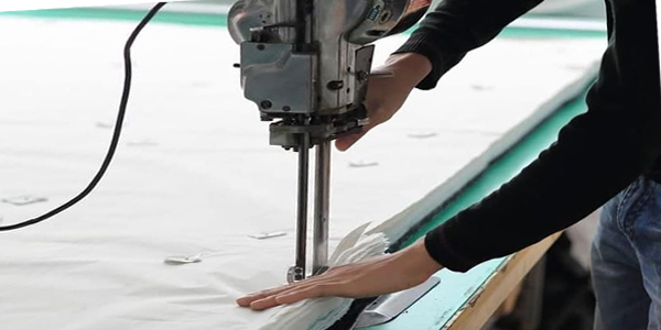 Fabric cutting stage at the Bromely Sports Sialkot workshop